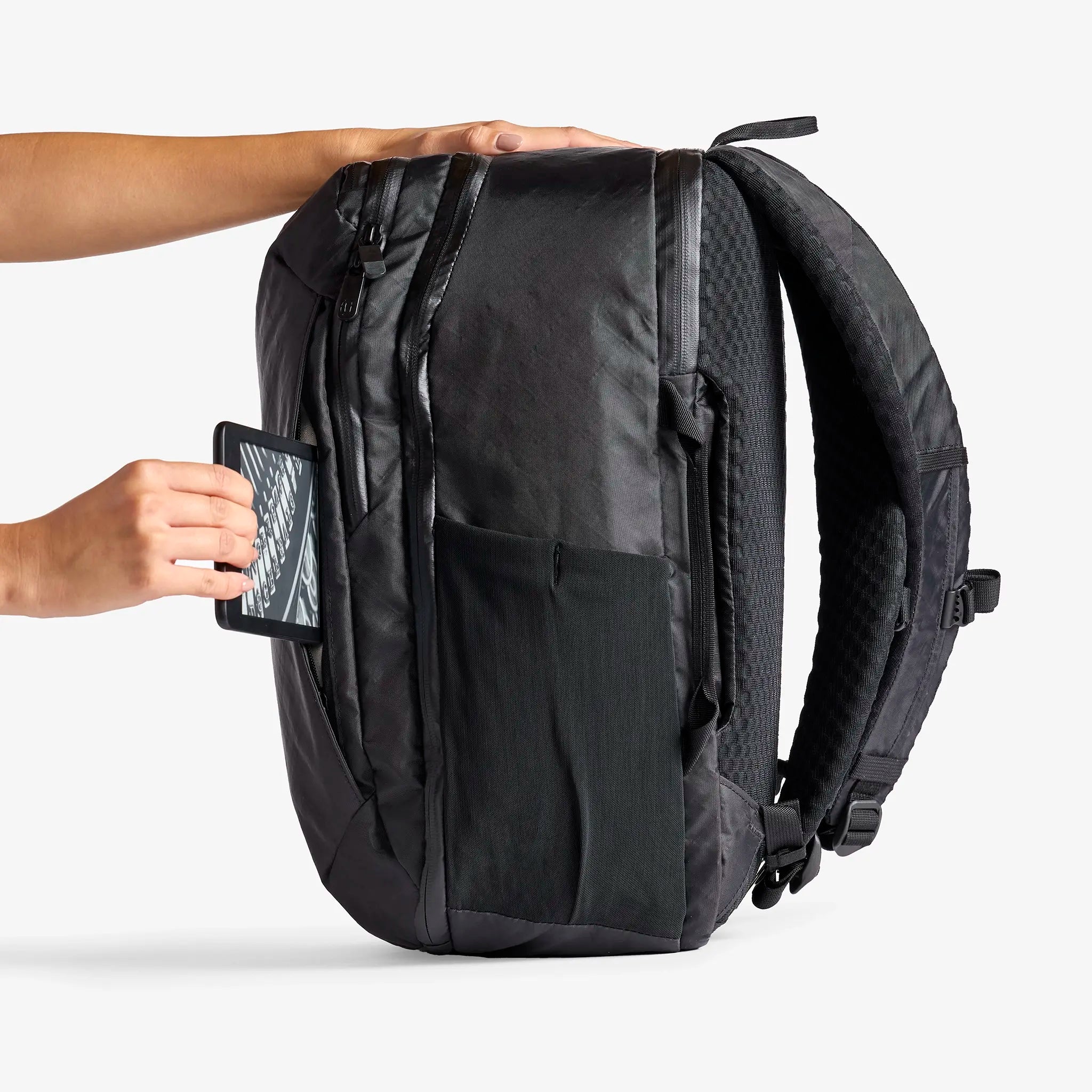 Flat front pocket for a notebook or Kindle