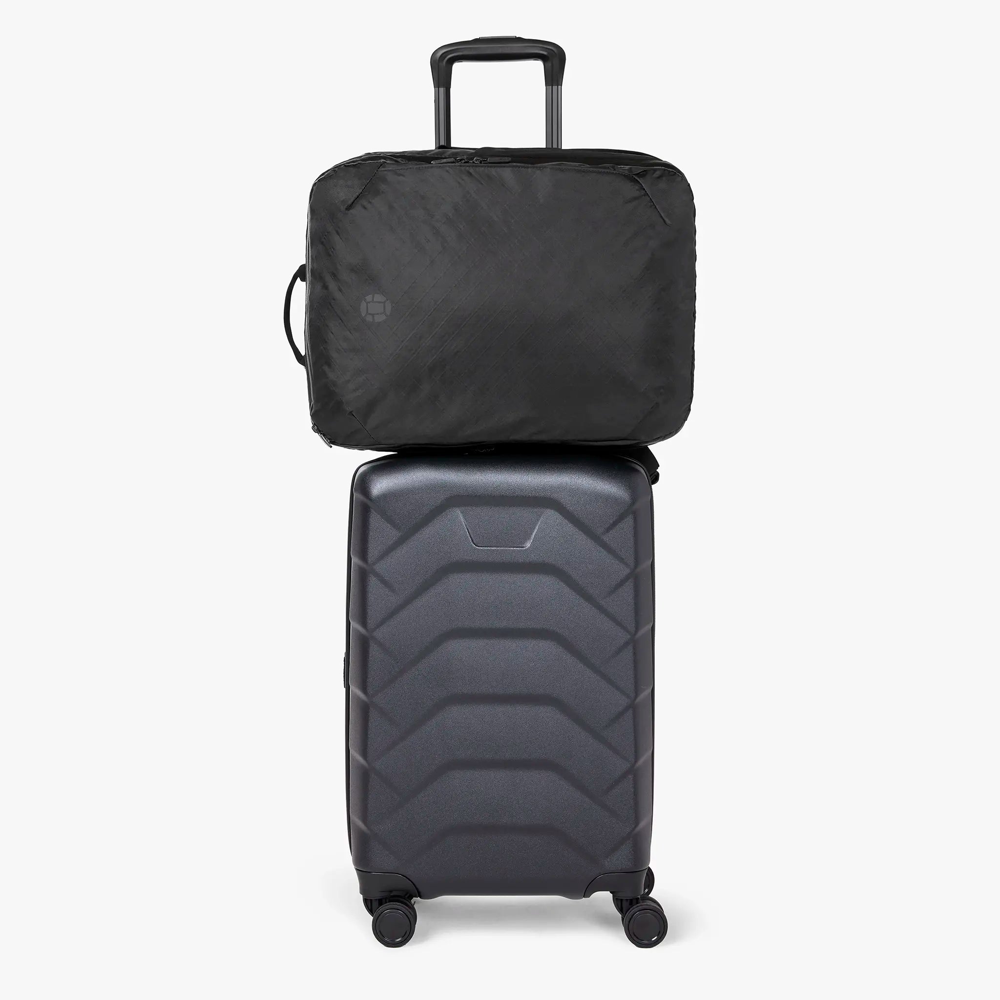 Luggage handle pass-through sleeve for hands-free carry