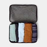 Pack shirts and pants in the large cube