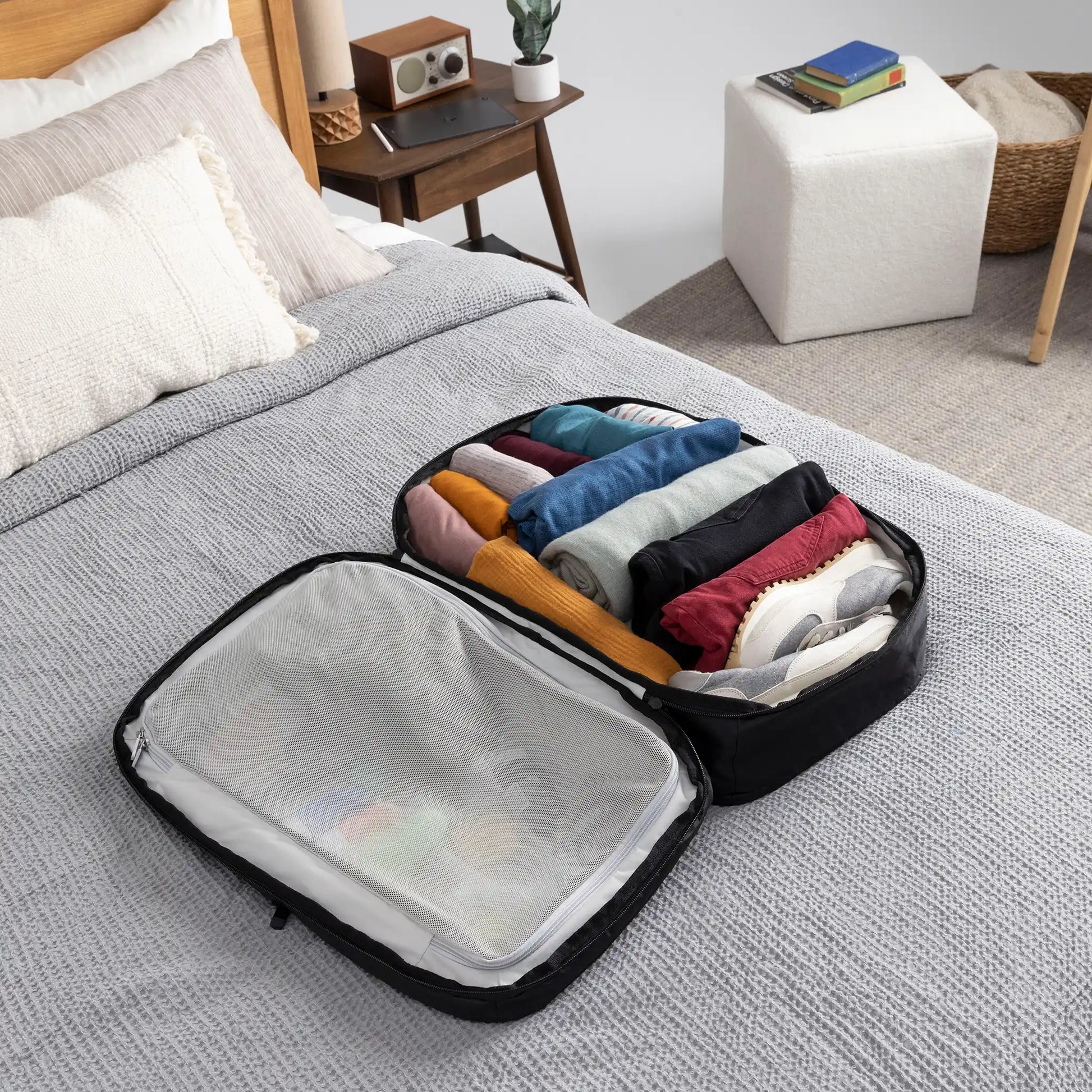 Packs like a suitcase for easy access and organization