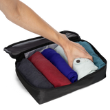 Pack shirts and pants in the large cube